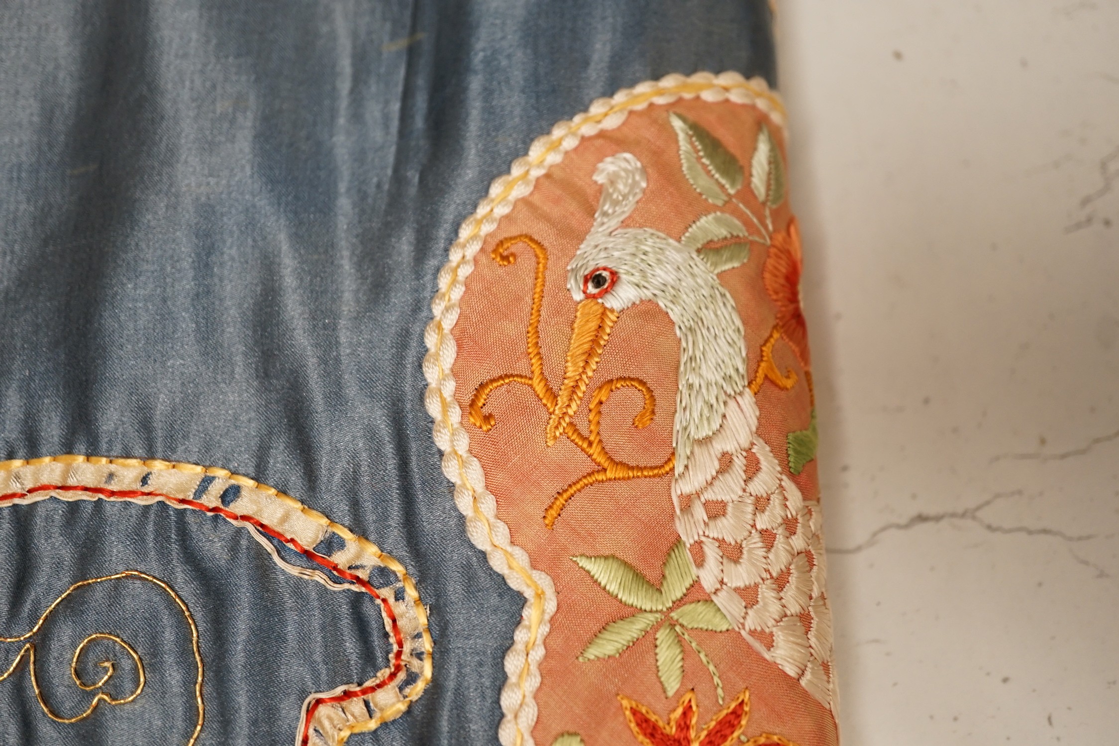 Three Chinese embroideries, including a Buddhist hanging